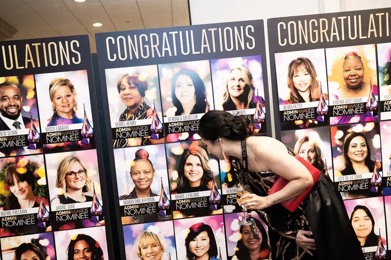 In an award event, the finalist viewing her poster