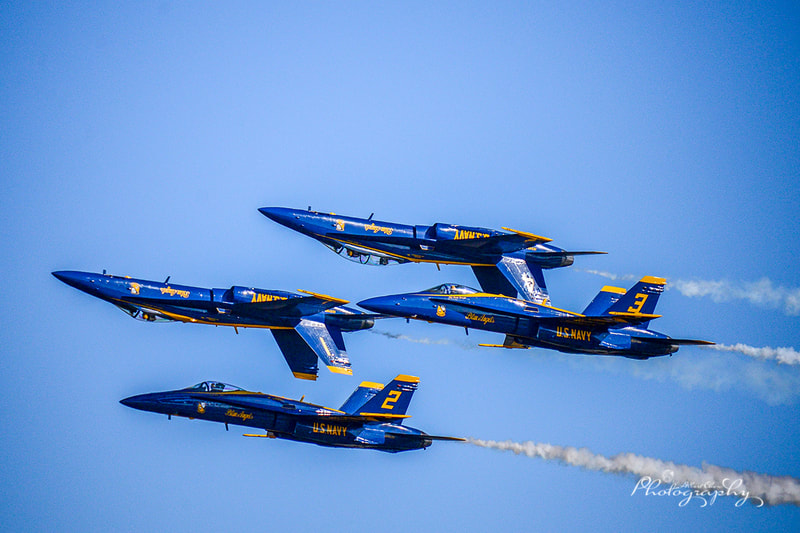 blue angels stunning formation at the wings over houston airshow