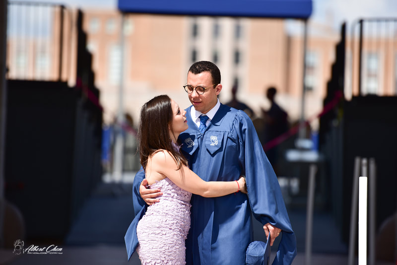 a couple celebrating graduation