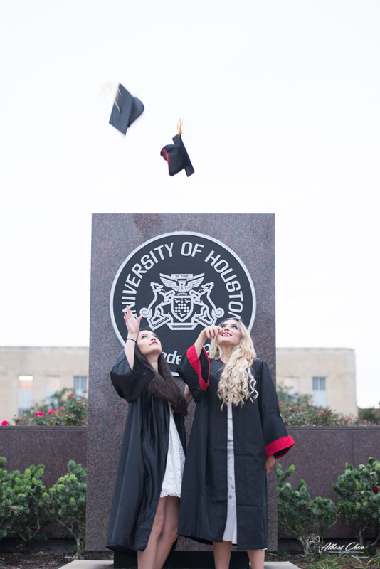graduate throwing their caps