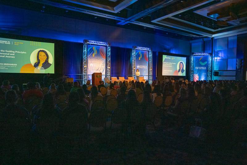 wide angle of the maing event ballroom at the conference 