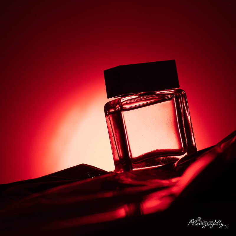 Perfume product photo with artistic vibe